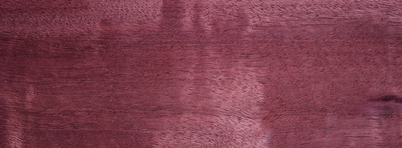 Purpleheart veneer sheet showing natural grain